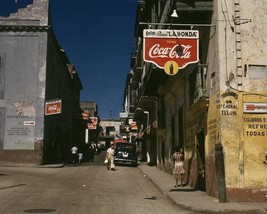 Coca-Cola signs on street in San Juan Puerto Rico December 1941 Photo Print - $8.81+