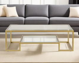 54&quot; Clear And Gold Glass And Steel Coffee Table With Shelf - $434.21