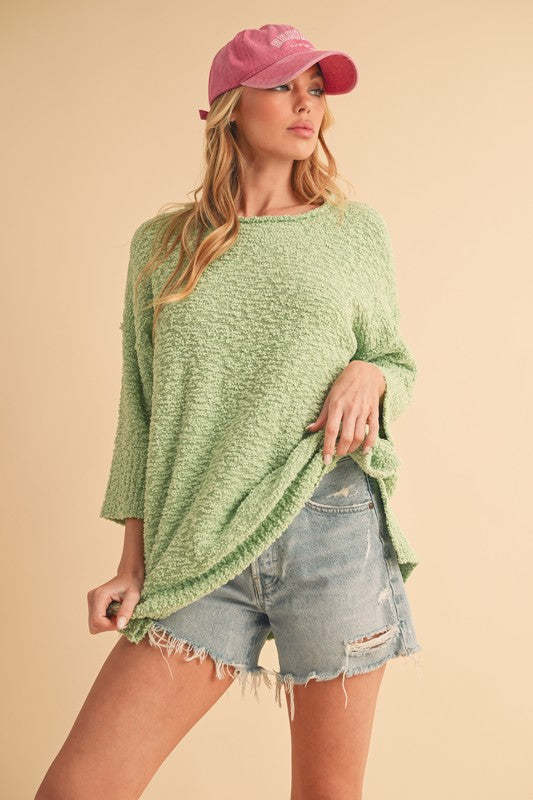 Aemi + Co Side Slit Ribbed Hem Round Neck Sweater - $39.54