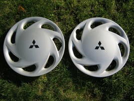Factory 1994 to 1996 Mitsubishi Mirage 13 inch hubcaps wheel covers mint - $38.92