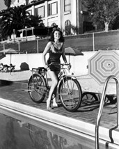 Rita Hayworth Riding Bicycle By Pool 16X20 Canvas Giclee - $69.99