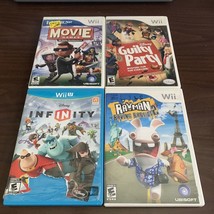 Wii Lot 4 Games Disney Guilty Party &amp; Infinity Rayman Movie Game Used - £12.47 GBP