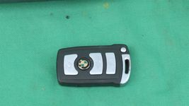 06-07 BMW 750i ECM ECU DME Engine Control Module 7549700 & Ignition Switch image 2