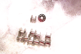 bobbins, 12 in plastic box (a) - $3.00