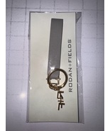 Rodan and Fields gray leatherette &amp; gold metal signature R&amp;F charm key c... - $128.90 MXN