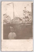 RPPC Edwardian Little Mischievous Girl Photo Under Electric Pole Postcard G34 - $8.95