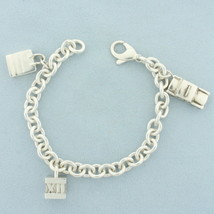 Tiffany and Co. Vintage Charm Bracelet with Taxi, Shopping Bag, Atlas Cube Charm - £952.60 GBP