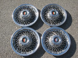 Genuine 1978 to 1984 Buick Lesabre Park Avenue 15 inch wire spoke hubcaps - $256.78