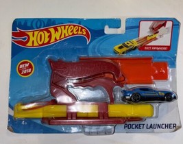 HOT WHEELS POCKET LAUNCHER RACE ANYWHERE  WITH CAR INCLUDED RED - $8.90