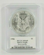 1986 $1 Silver American Eagle Graded by PCGS as MS69 First Strike Mercanti Sign - £2,572.48 GBP