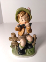 Boy Sitting On Fence Playing Flute  Porcelain Figurine Home Decor Farmho... - $11.05