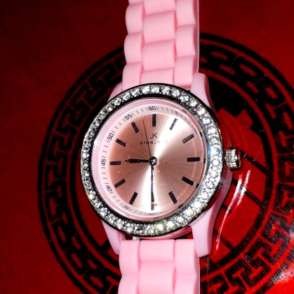 Primary image for Kim and Jade NWOT ladies pink silicone watch with rhinestones/very beautiful