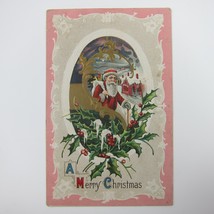 Vintage Christmas Postcard Santa Snowy Town Night Holly Gold Embossed Antique - £16.03 GBP