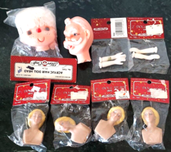 Lot of 8 Vintage Fibre-Craft Doll Heads Arms Santa Face Craft NOS Korea - $19.79