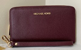 New Michael Kors Jet Set Travel Large Flat phone case wallet Merlot - $71.16
