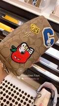 NWT Coach X Peanuts Small Boxy Cosmetic Case In Signature Canvas With Varsity Pa - £102.31 GBP