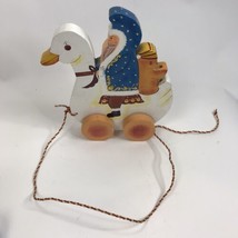 Vtg Christmas Wood Folk Art Santa Belsnickle Riding Duck Goose Rolling Figurine - $19.79