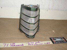 71 Olds TORONADO LEFT DRIVER SIDE FRONT CORNER PARK MARKER LIGHT LENS BEZEL - $49.49