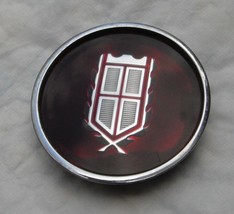 Vintage car grill emblem badge or  wheel center cap---old er - $75.00