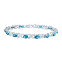 6x4mm Oval Simulated Topaz &quot;XO&quot; Link Tennis Bracelet in 14K White Gold Plated 7&quot; - £121.87 GBP