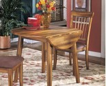 Signature Design By Ashley Berringer Round rustic Leaf Table - $264.09