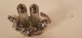 Small Vintage Salt and Pepper Set, Rabbits in Cast Metal Holder - $16.70