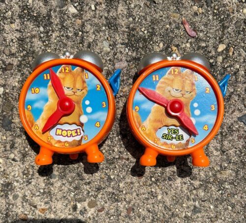 Primary image for Vintage Garfield The Movie Clock 2004 Fortune Telling Alarm Clock Lot Of 2 Works