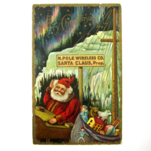 Christmas Postcard Santa North Pole Bag Toys Northern Lights Sky Antique... - £15.84 GBP