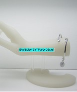 B66 .925 argentium sterling silver bypass with blue topaz  tube bangle - $115.12 CAD