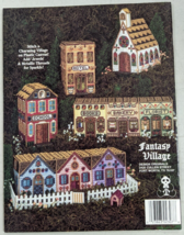 Plastic Canvas Fantasy Village Suzanne McNeill Stitching Buildings Doll Houses - $8.90