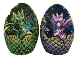 Set of 2 Green And Pink Baby Dragons In LED Faux Geode Eggs With Dragon Scales - £26.37 GBP