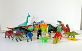 25 Pc Dinosaur Toy Figures With 6 piece wind up Versions - $9.49