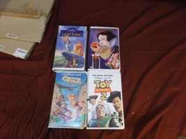 lot of 4 Walt Disney movies lion king toy story 2 snow white the rescuer RS 7746 - £14.64 GBP