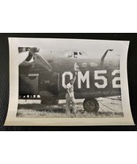 B&amp;W WWII Photograph - Aviator Reaching For The Gal On The B-24 Bomber - $9.11 CAD