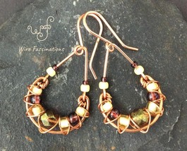 Handmade copper earrings: criss cross wire wrapped amber purple glass teardrop - $33.00
