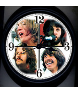 The Beatles # 2 Wall Clock - $614.12 MXN
