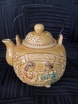 Vtg Japan Brownish Yellow Tea Time Ceramic Teapot Metal Wire Handle floral - $16.00