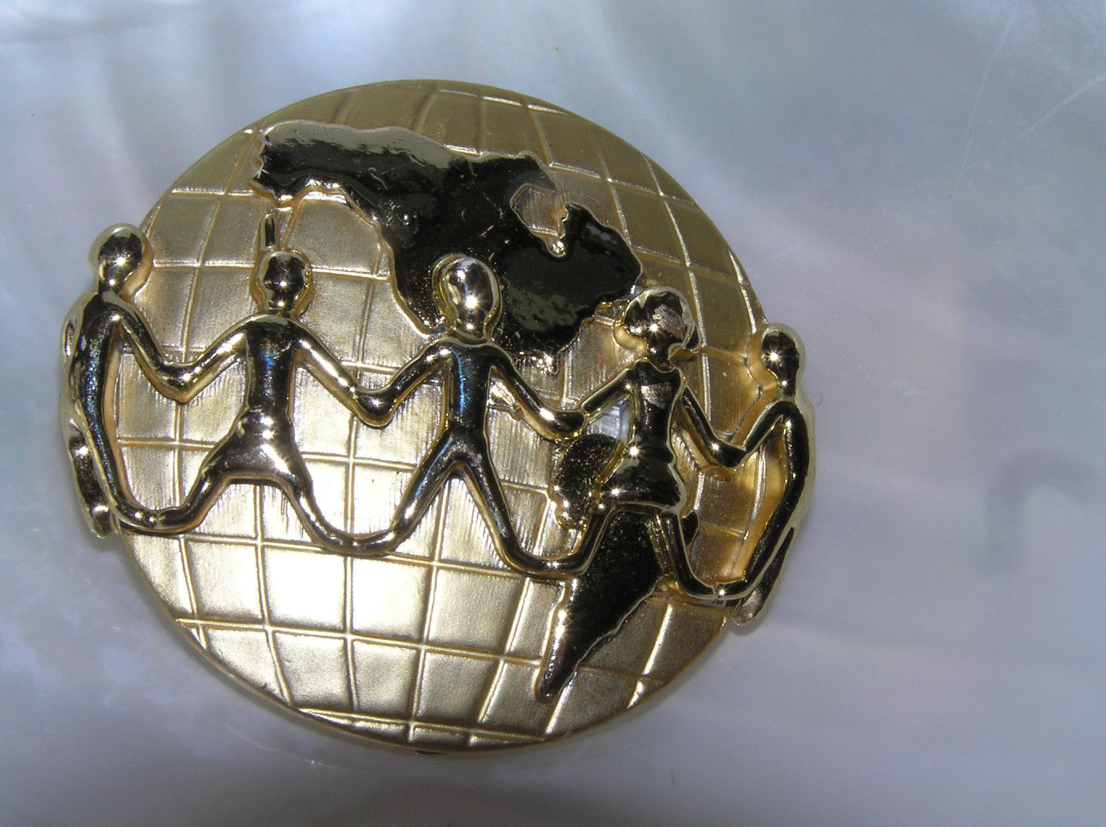 Vintage Hallmarked People Helping People Around The World Goldtone Globe Pin - $12.19