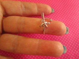 Silver twist knot ear cuff - $181.47 MXN