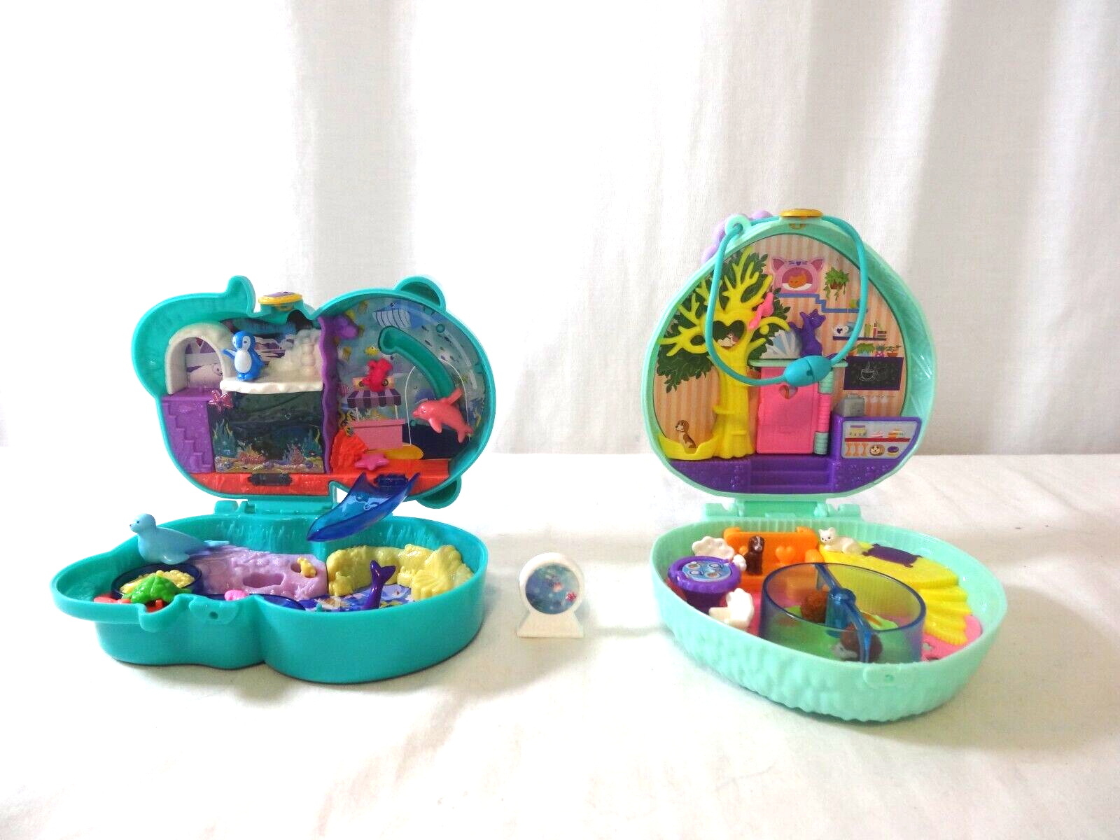 Primary image for Polly Pocket Hedgehog Cafe Compact Playset  + Polly Pocket Otter Aquarium Compac
