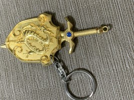 Retro Sword and Shield Metal Keychain Gold Key Chain - $407.31 MXN