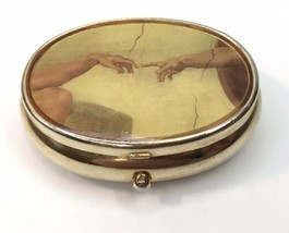 Gold Tone Pill Box w/ Michelangelo&#39;s &quot;The Creation of Adam&quot; on the Lid A... - $12.00
