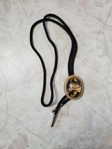 Bolo Tie Covered Wagon Gold Colored Country Western Necklace Black Cord - £13.53 GBP