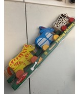 BRAND NEWMelissa &amp; Doug Wooden Stacking Pets Pull Along Dog, Bunny, Cat - $696.05 MXN
