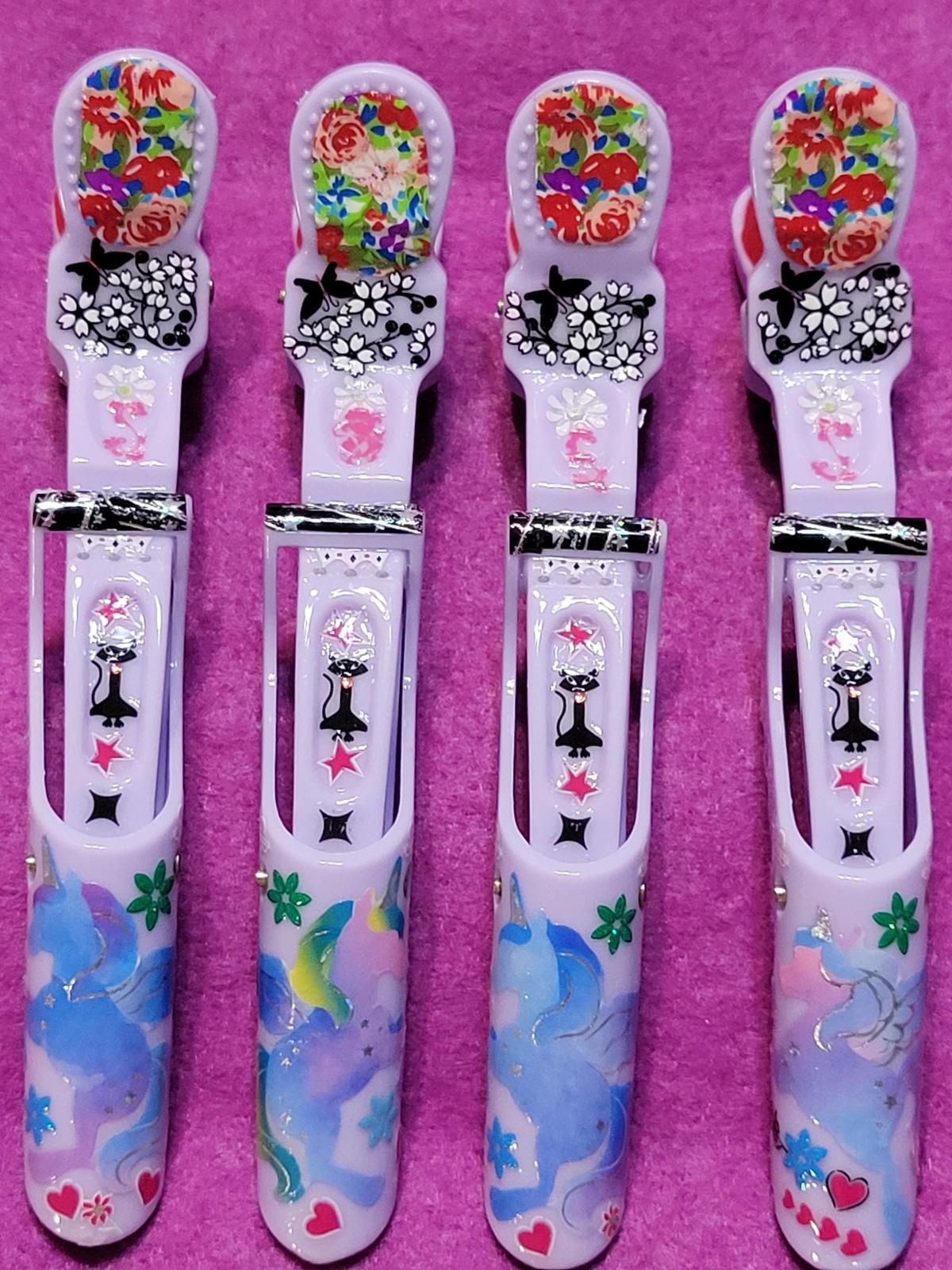 EFFERVESCENT hair-clip group. C.2024 - $17.00