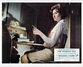 The Ipcress File 8x10 inch photo Sue Lloyd sat at desk pointing gun - £7.65 GBP
