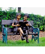 Bronze Boy and Girl Sitting on Bench Reading Book Sculpture