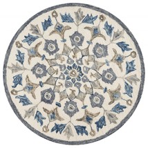 HomeRoots 393672 6 ft. Round Blue Floral Oasis Area Rug - £183.76 GBP