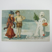 Christmas Postcard Children Boy Girl Snowman Holds Tree Basket Embossed Antique - £7.98 GBP