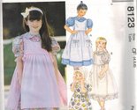 8123 McCalls Sewing Pattern Uncut Girls Dress Pinafore Size 6 7 8 - $9.78